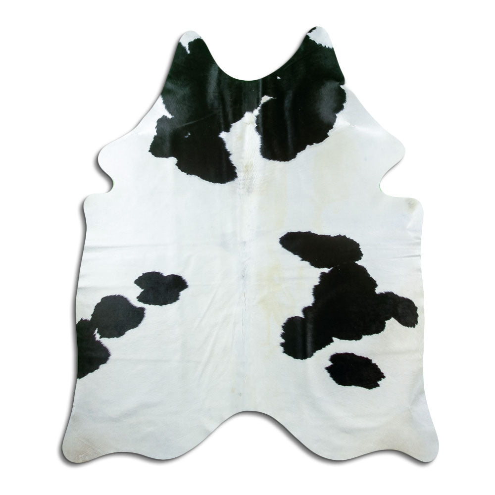 Peau de vache noir et blanc d’environ 180 × 150 cm, vue de dessus : exactement la peau que vous recevez