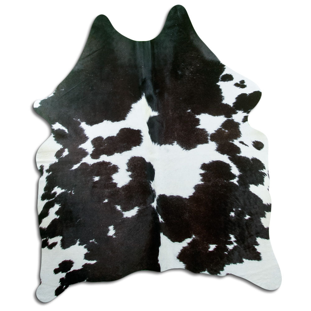 Peau de vache noir et blanc d’environ 180 × 150 cm, vue de dessus : exactement la peau que vous recevez
