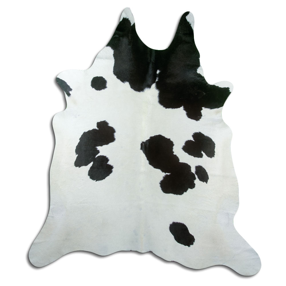 Peau de vache noir et blanc d’environ 230 × 210 cm, vue de dessus : exactement la peau que vous recevez