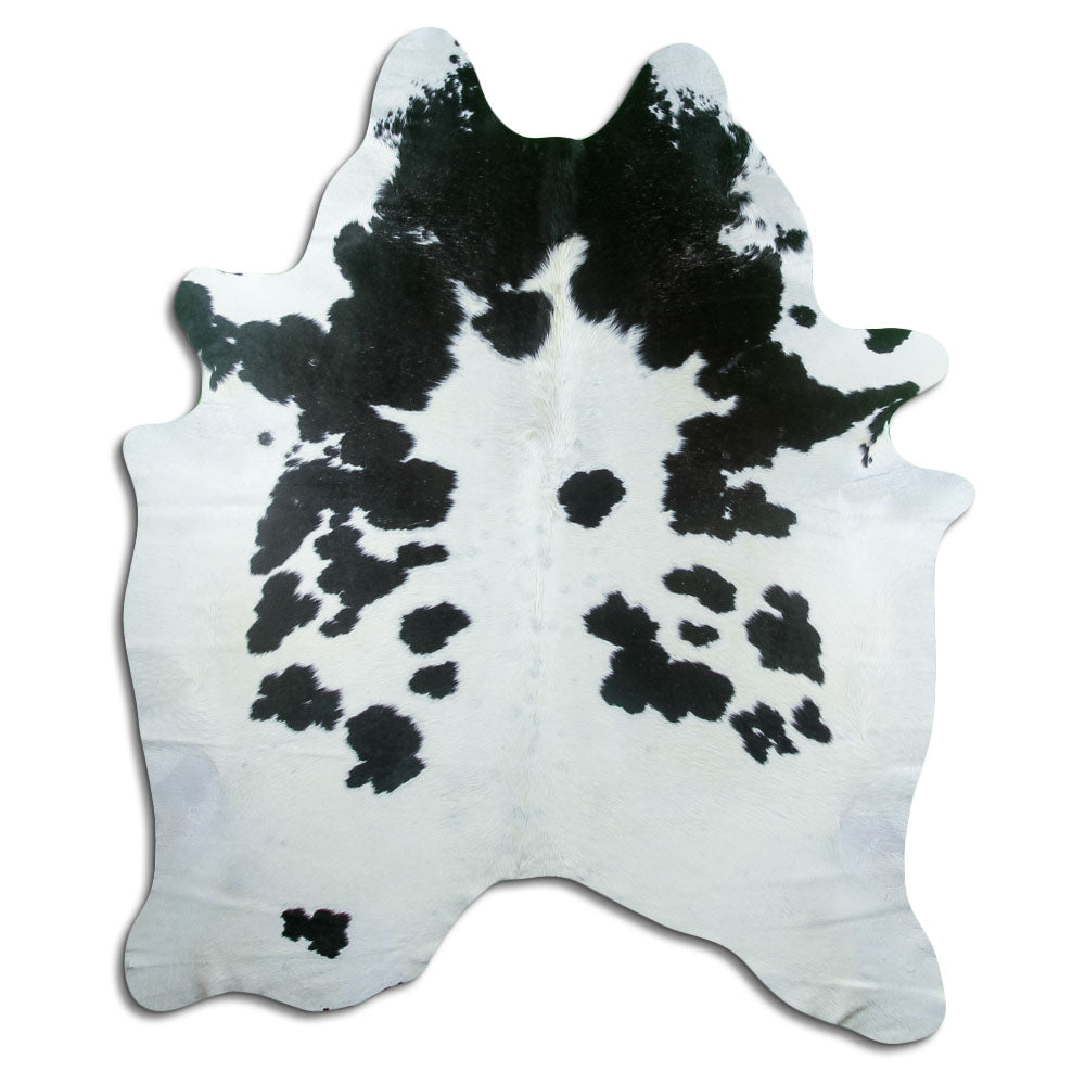 Peau de vache noir et blanc d’environ 210 × 180 cm, vue de dessus : exactement la peau que vous recevez