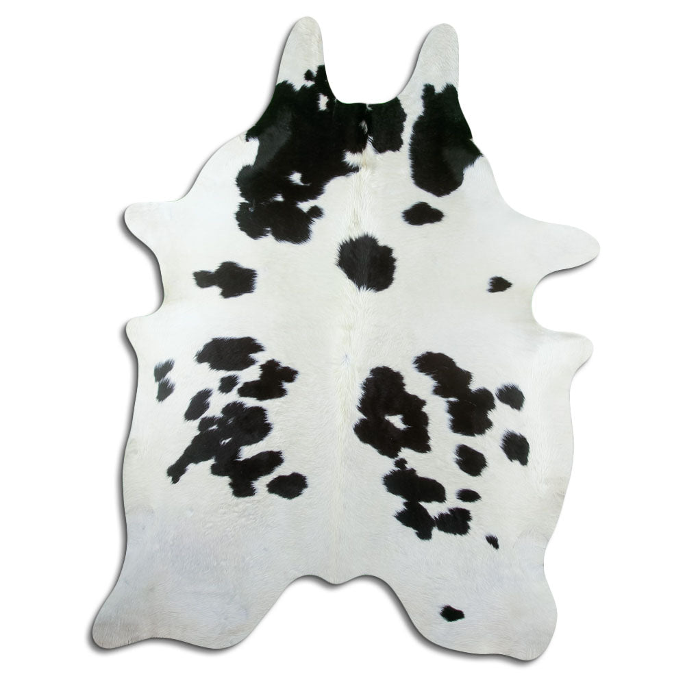 Peau de vache noir et blanc d’environ 230 × 170 cm, vue de dessus : exactement la peau que vous recevez