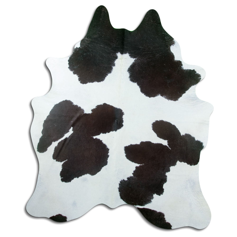 Peau de vache noir et blanc d’environ 210 × 180 cm, vue de dessus : exactement la peau que vous recevez