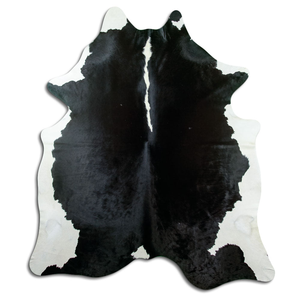 Peau de vache noir et blanc d’environ 220 × 200 cm, vue de dessus : exactement la peau que vous recevez