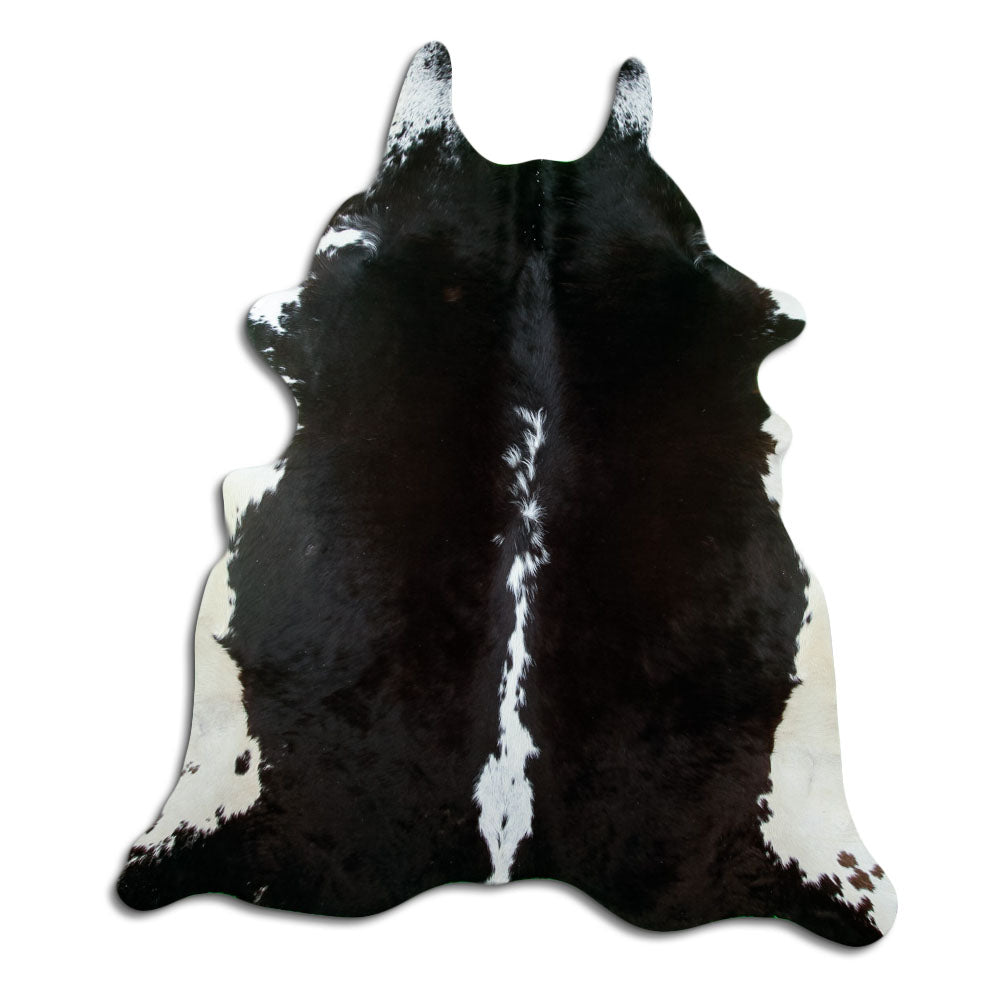 Peau de vache noir et blanc d’environ 220 × 190 cm, vue de dessus : exactement la peau que vous recevez