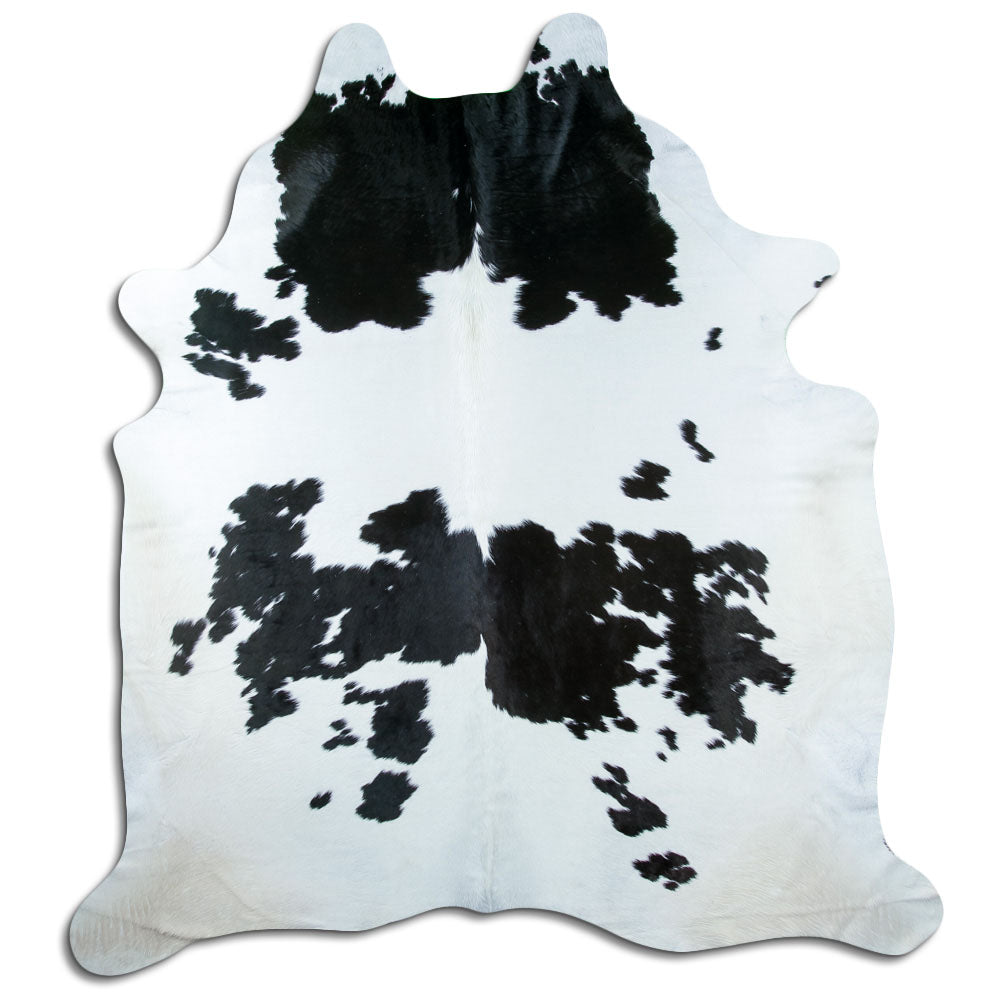 Peau de vache noir et blanc d’environ 240 × 210 cm, vue de dessus : exactement la peau que vous recevez