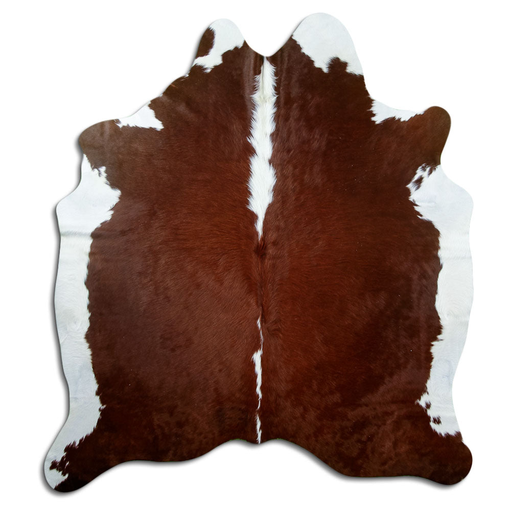 Peau de vache marron et blanc d’environ 190 × 170 cm, vue de dessus : exactement la peau que vous recevez