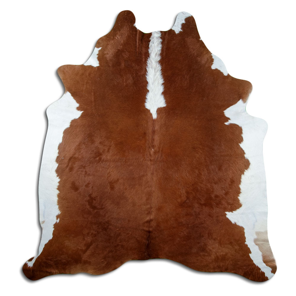 Peau de vache marron et blanc d’environ 220 × 200 cm, vue de dessus : exactement la peau que vous recevez