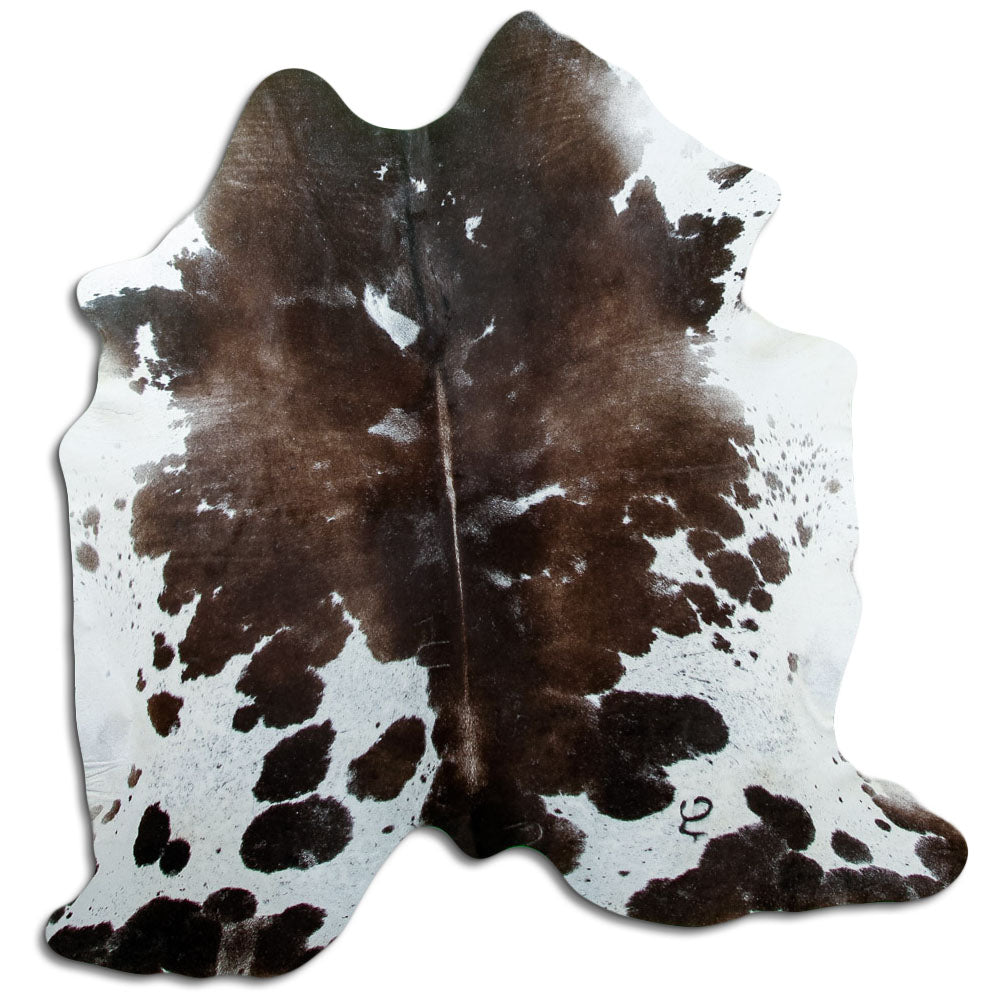 Peau de vache marron et blanc d’environ 180 × 170 cm, vue de dessus : exactement la peau que vous recevez