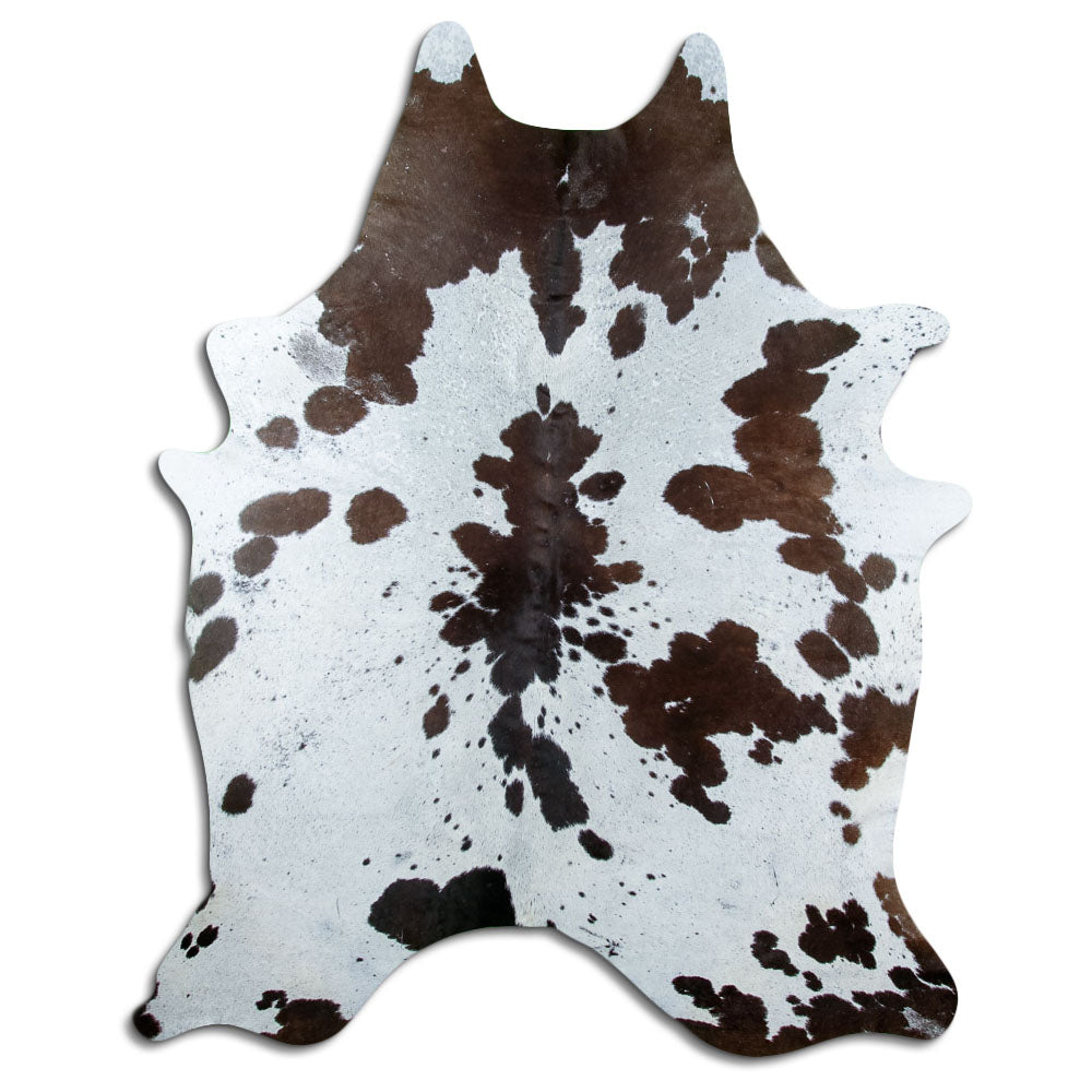 Peau de vache marron et blanc d’environ 230 × 180 cm, vue de dessus : exactement la peau que vous recevez