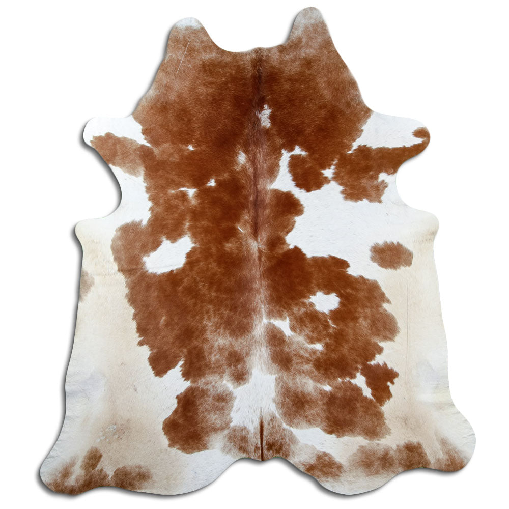 Peau de vache marron et blanc d’environ 220 × 200 cm, vue de dessus : exactement la peau que vous recevez