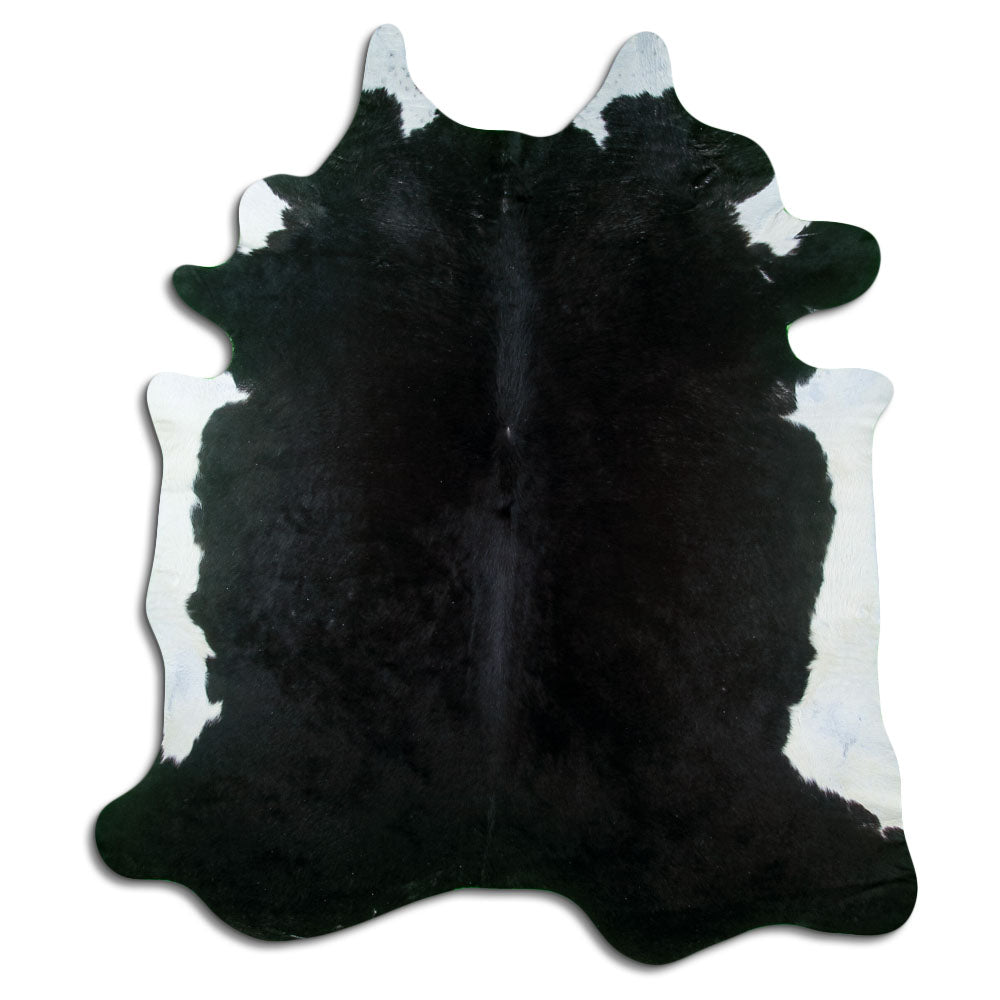 Peau de vache noire d’environ 220 × 190 cm, vue de dessus : exactement la peau que vous recevez