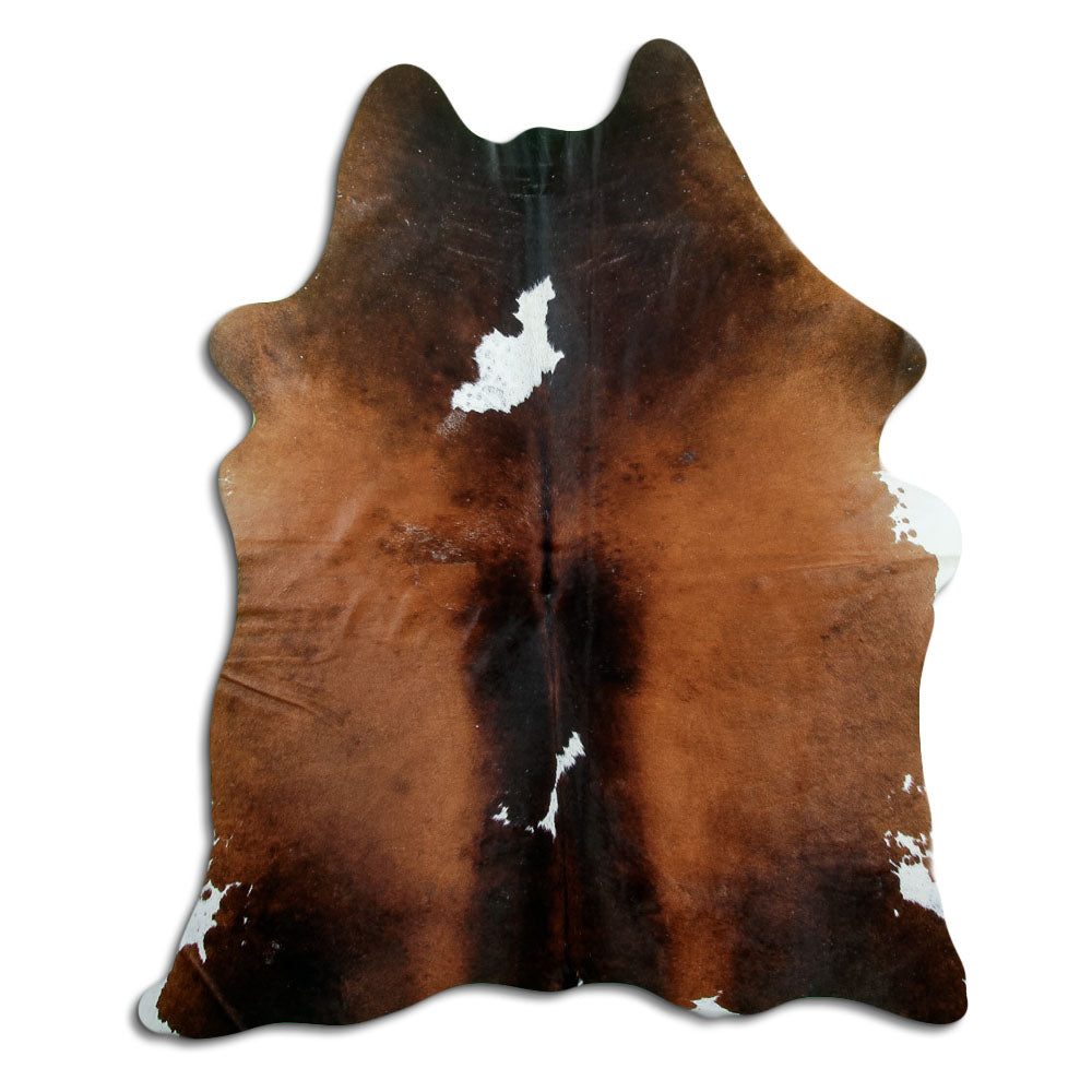 Peau de vache tricolore d’environ 200 × 160 cm, vue de dessus : exactement la peau que vous recevez