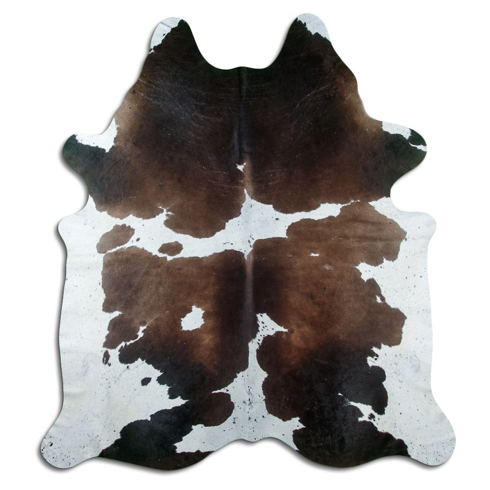 Peau de vache tricolore d’environ 230 × 210 cm, vue de dessus : exactement la peau que vous recevez