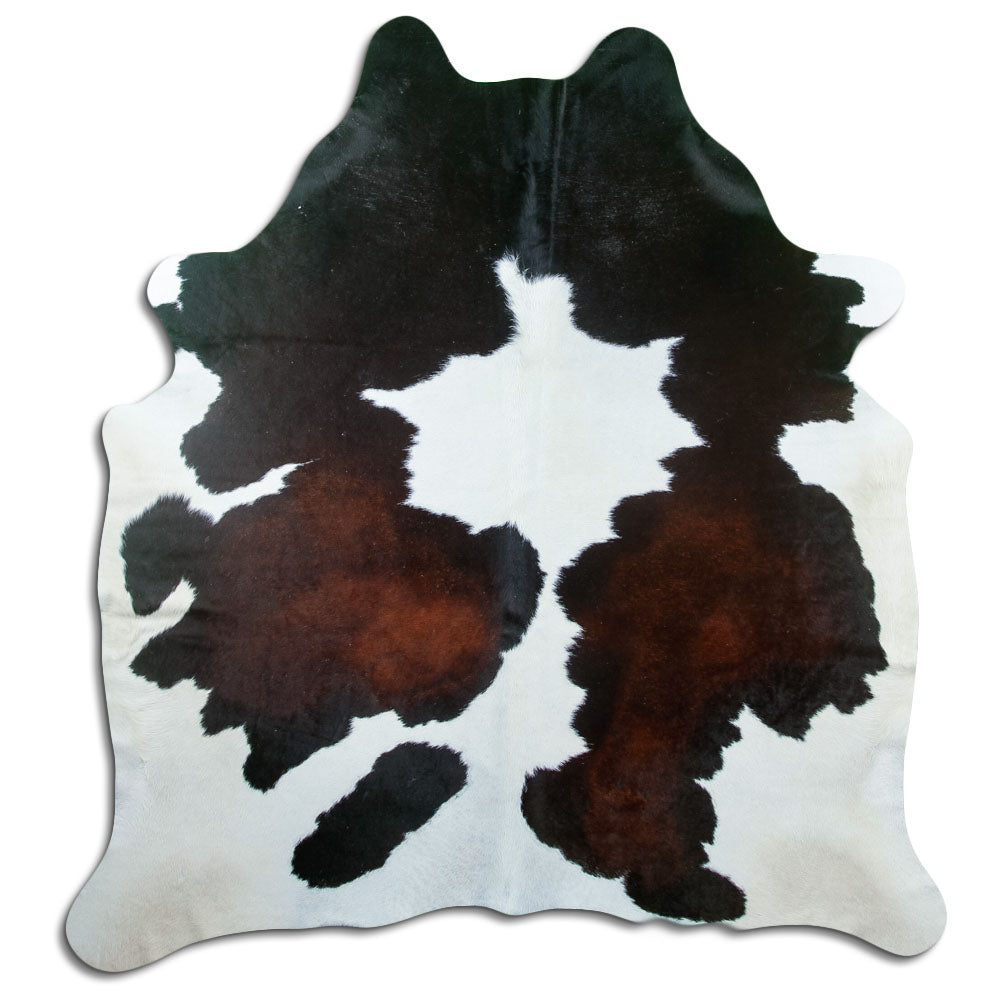 Peau de vache tricolore d’environ 210 × 190 cm, vue de dessus : exactement la peau que vous recevez