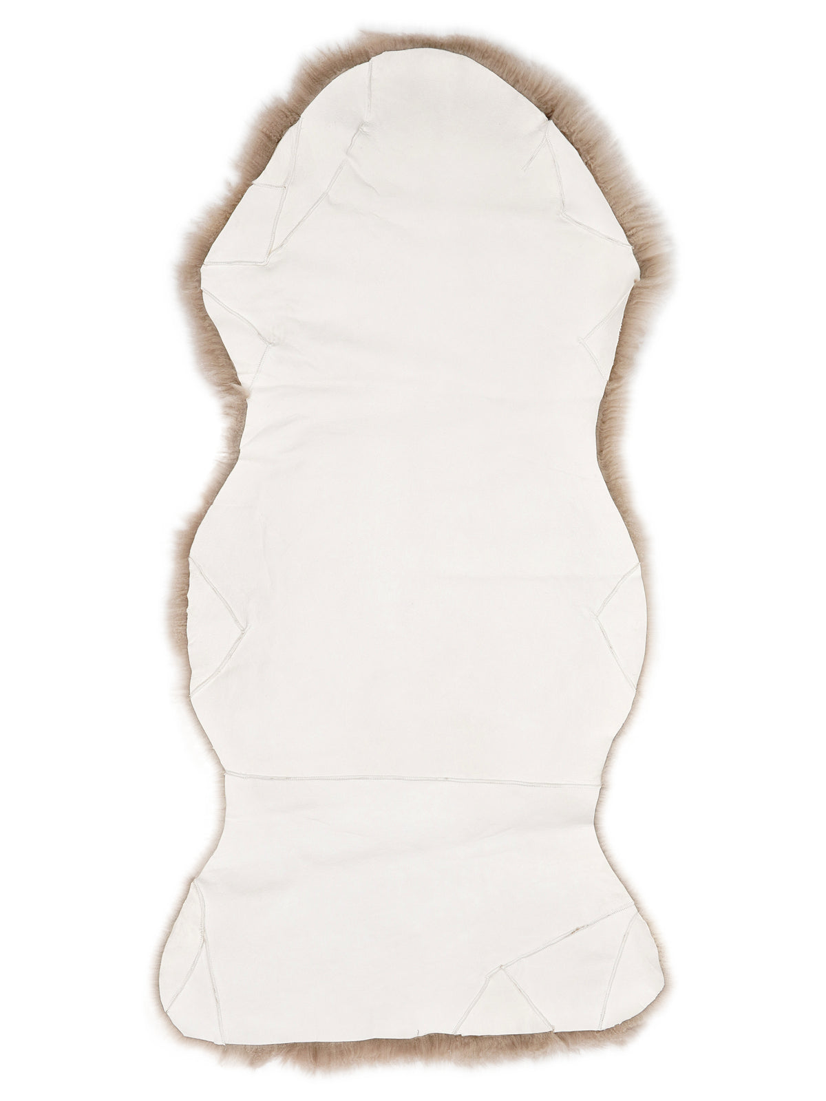 Peau de mouton de Nouvelle-Zélande, côté cuir avec les coutures