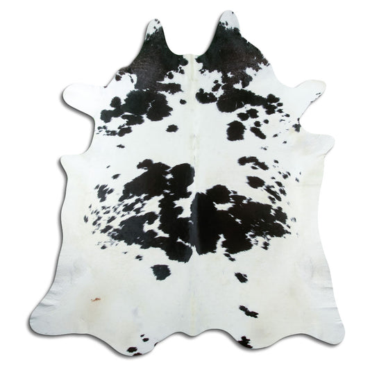 Peau de vache noir et blanc d’environ 220 × 200 cm, vue de dessus : exactement la peau que vous recevez