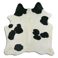 Peau de vache noire et blanche M