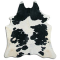 Peau de vache noire et blanche XL