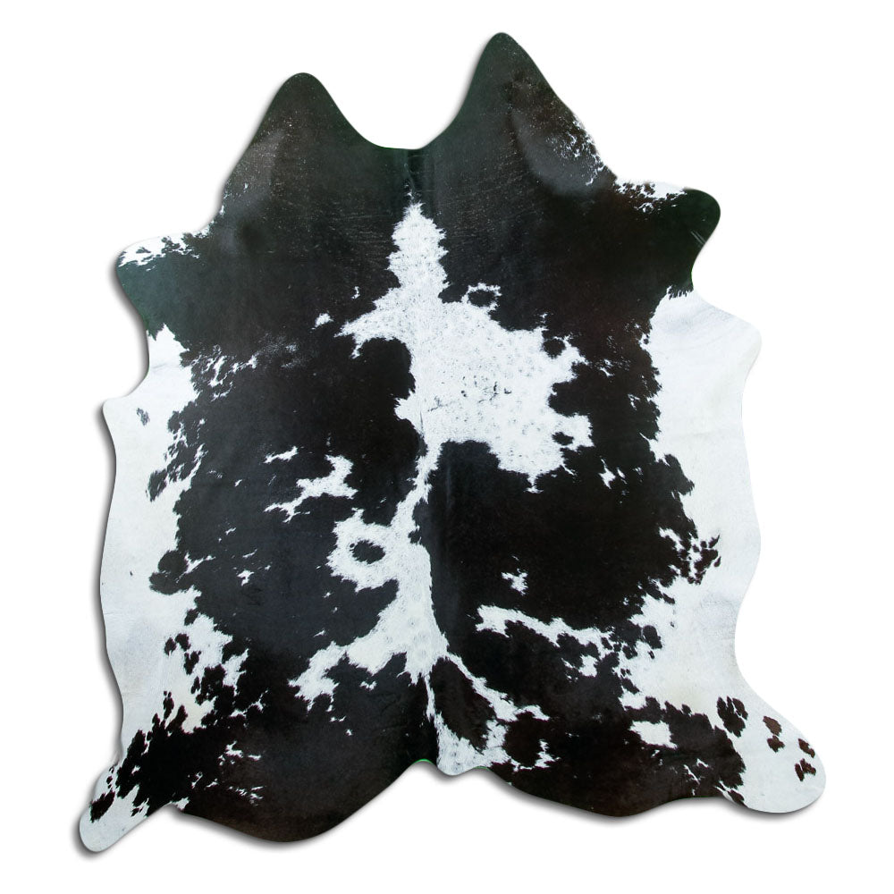 Peau de vache noir et blanc d’environ 180 × 170 cm, vue de dessus : exactement la peau que vous recevez
