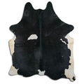 Peau de vache noire et blanche XL