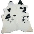 Peau de vache noire et blanche M