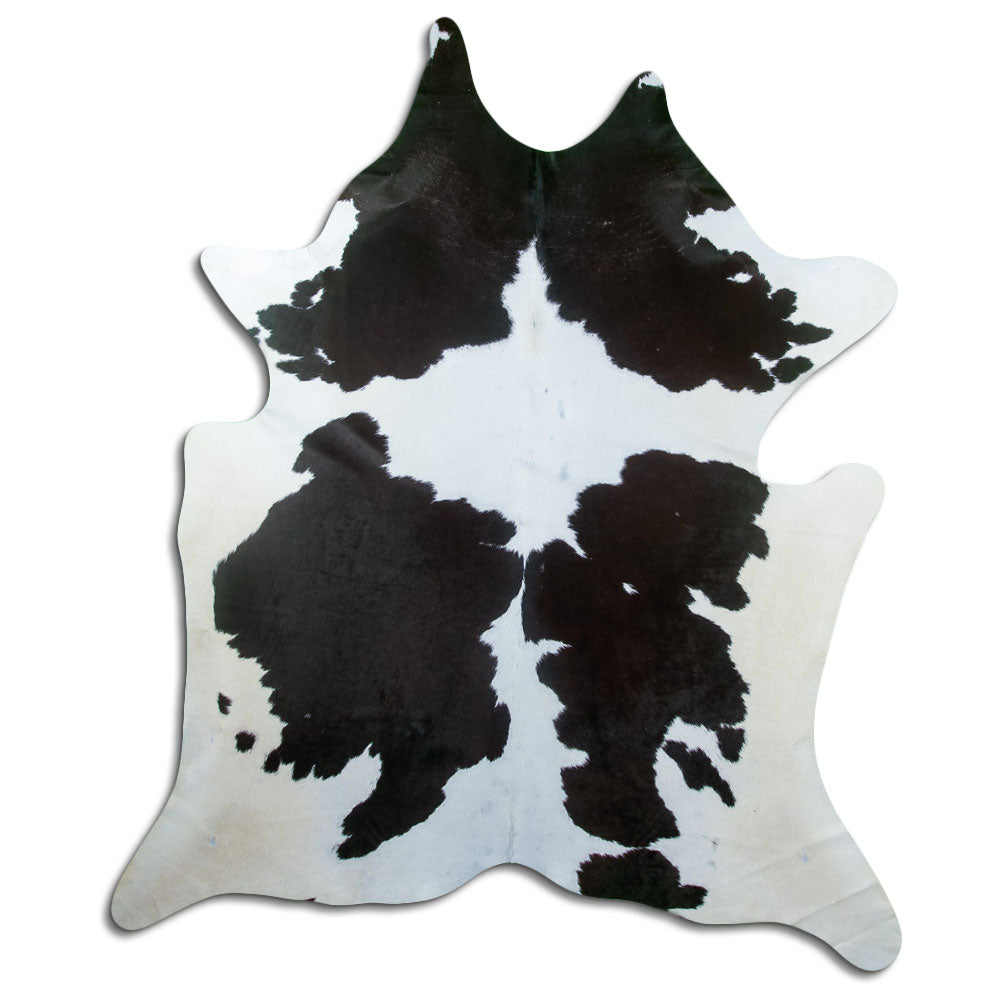 Peau de vache noir et blanc d’environ 220 × 200 cm, vue de dessus : exactement la peau que vous recevez