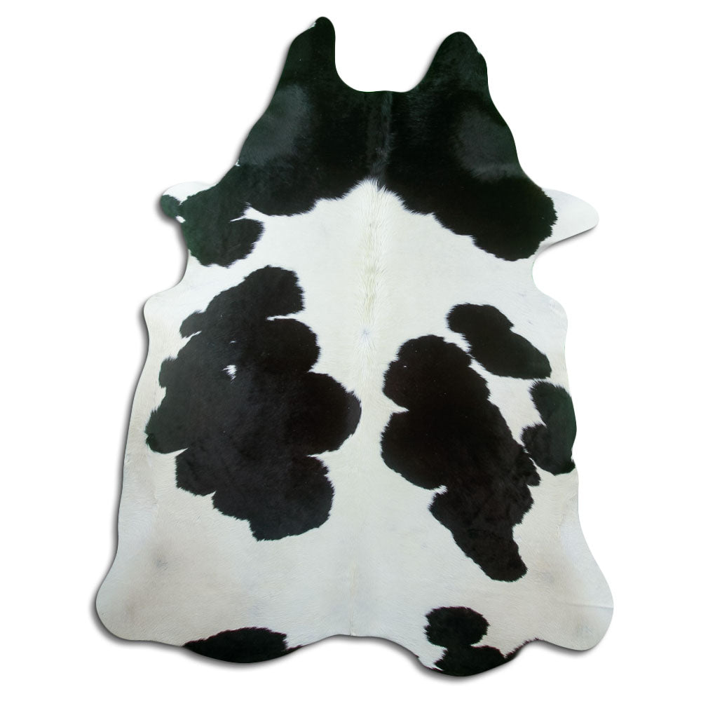 Peau de vache noir et blanc d’environ 220 × 180 cm, vue de dessus : exactement la peau que vous recevez