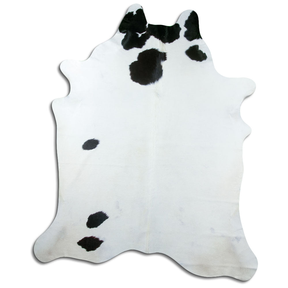 Peau de vache noir et blanc d’environ 230 × 190 cm, vue de dessus : exactement la peau que vous recevez