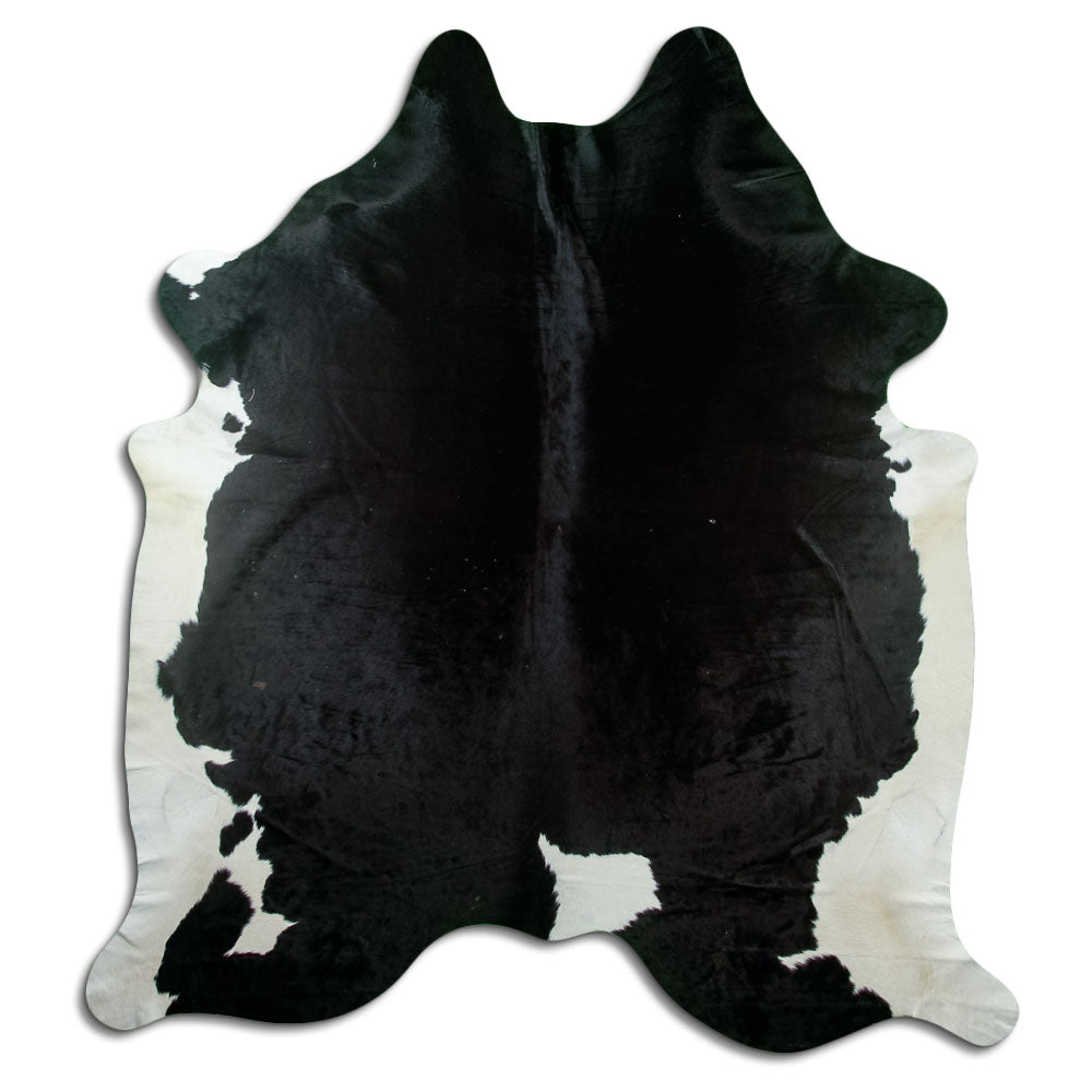 Peau de vache noir et blanc d’environ 230 × 210 cm, vue de dessus : exactement la peau que vous recevez