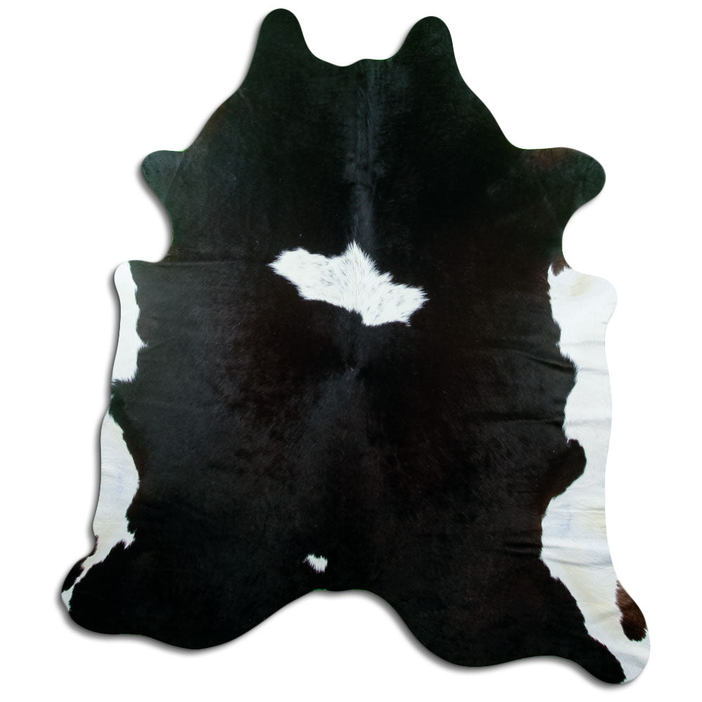 Peau de vache noir et blanc d’environ 210 × 180 cm, vue de dessus : exactement la peau que vous recevez