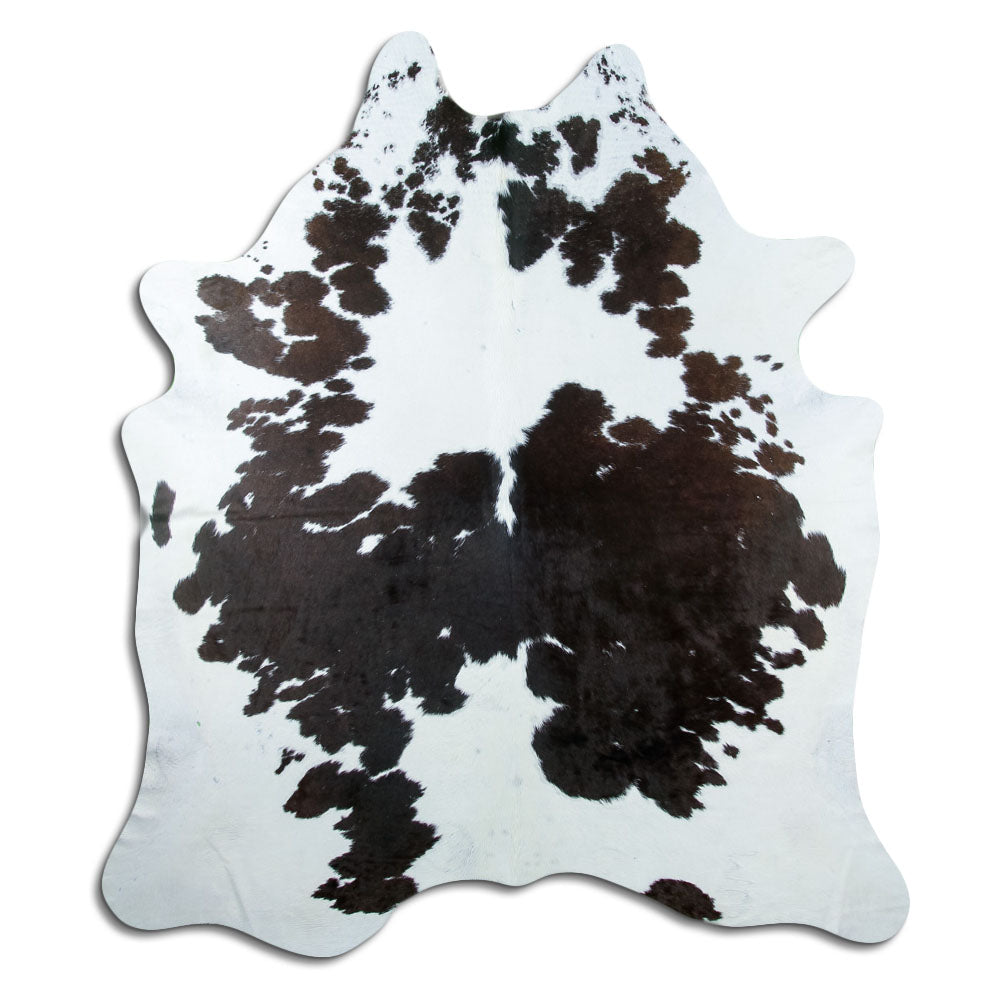 Peau de vache noir et blanc d’environ 220 × 200 cm, vue de dessus : exactement la peau que vous recevez