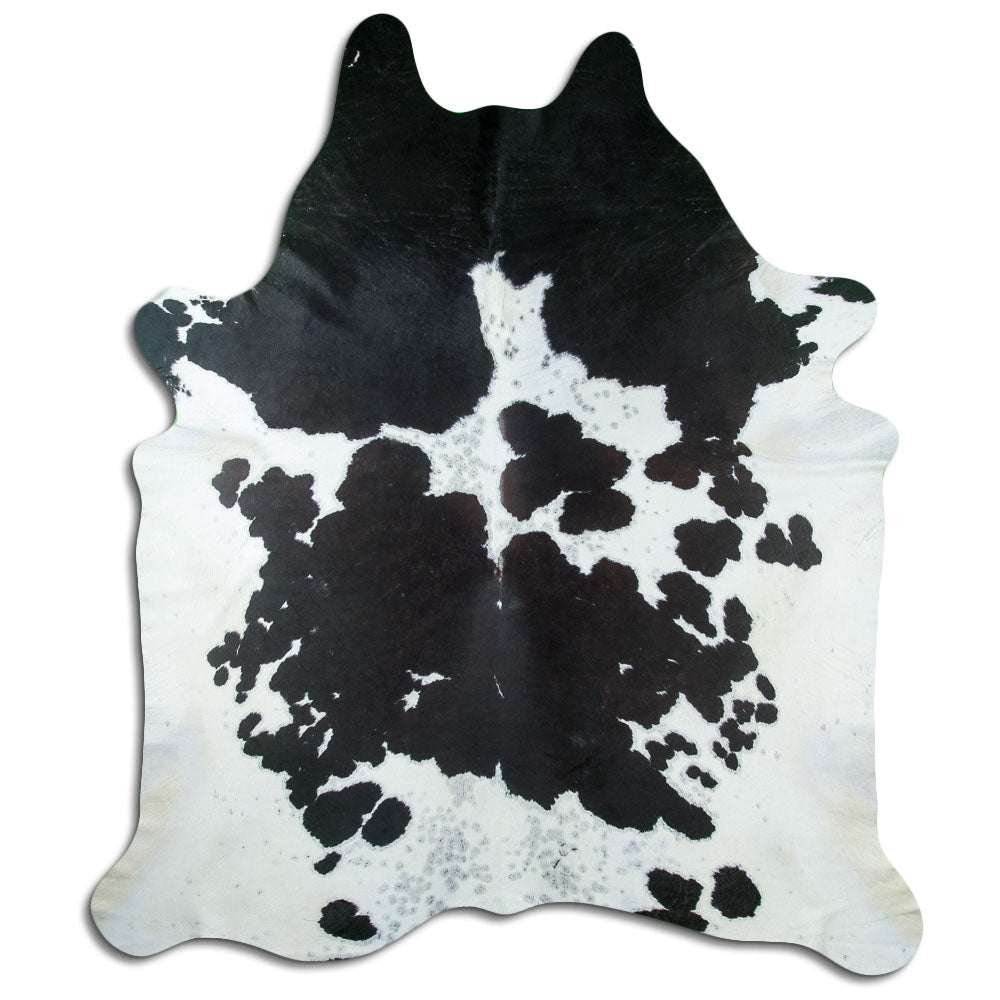 Peau de vache noir et blanc d’environ 240 × 210 cm, vue de dessus : exactement la peau que vous recevez