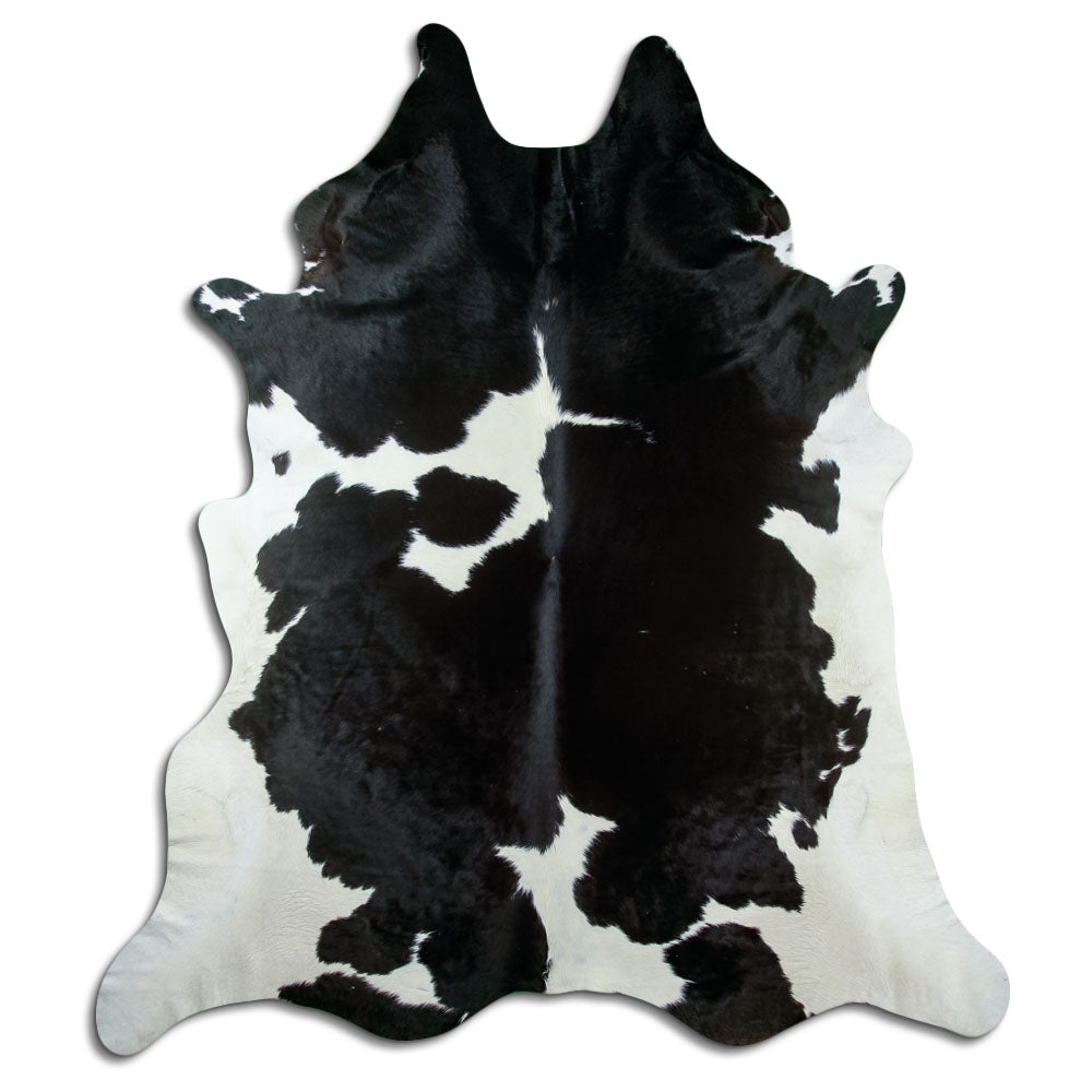 Peau de vache noir et blanc d’environ 250 × 220 cm, vue de dessus : exactement la peau que vous recevez