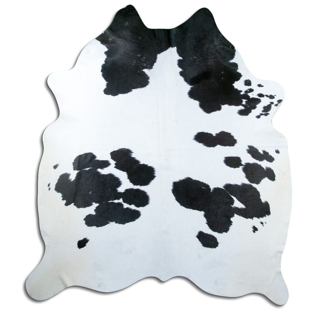 Peau de vache noir et blanc d’environ 230 × 210 cm, vue de dessus : exactement la peau que vous recevez