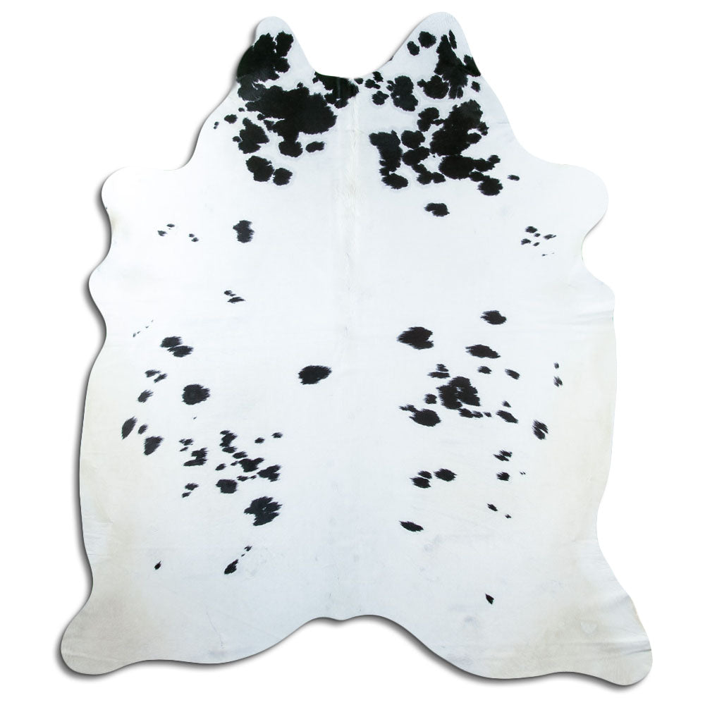 Peau de vache noir et blanc d’environ 220 × 190 cm, vue de dessus : exactement la peau que vous recevez