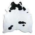 Peau de vache noir et blanc d’environ 200 × 180 cm, vue de dessus : exactement la peau que vous recevez