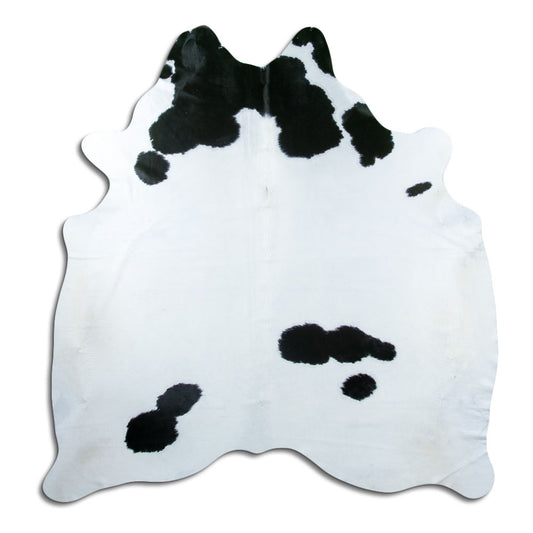 Peau de vache noir et blanc d’environ 200 × 180 cm, vue de dessus : exactement la peau que vous recevez