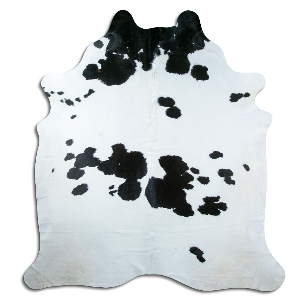 Peau de vache noir et blanc d’environ 220 × 210 cm, vue de dessus : exactement la peau que vous recevez