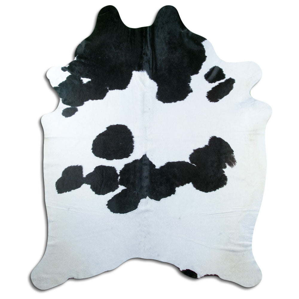 Peau de vache noir et blanc d’environ 230 × 180 cm, vue de dessus : exactement la peau que vous recevez