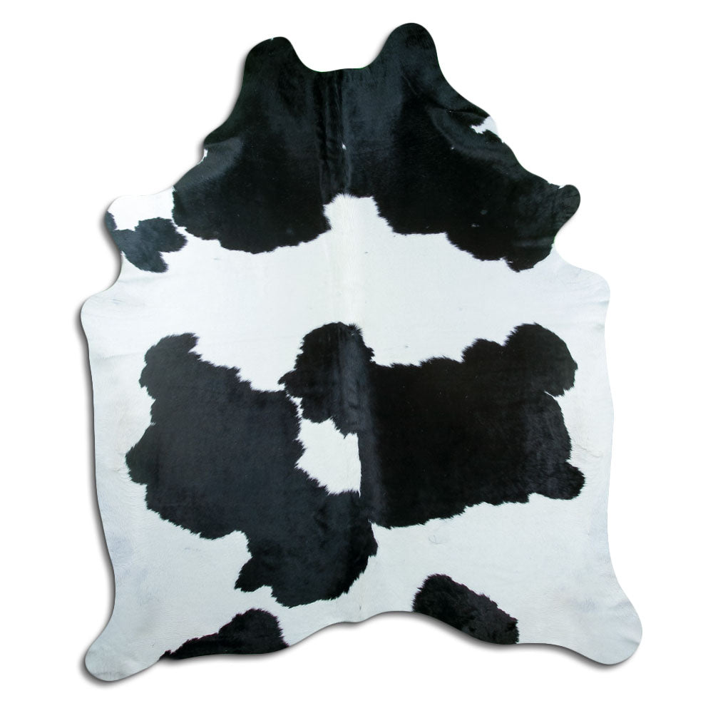 Peau de vache noir et blanc d’environ 230 × 190 cm, vue de dessus : exactement la peau que vous recevez