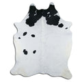 Peau de vache noire et blanche XL