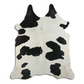 Peau de vache noire et blanche XL