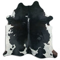Peau de vache noire et blanche XL