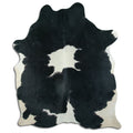 Peau de vache noire et blanche XL