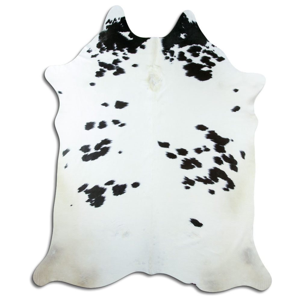 Peau de vache noir et blanc d’environ 230 × 190 cm, vue de dessus : exactement la peau que vous recevez