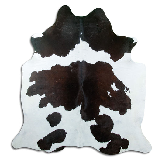 Peau de vache noir et blanc d’environ 200 × 190 cm, vue de dessus : exactement la peau que vous recevez