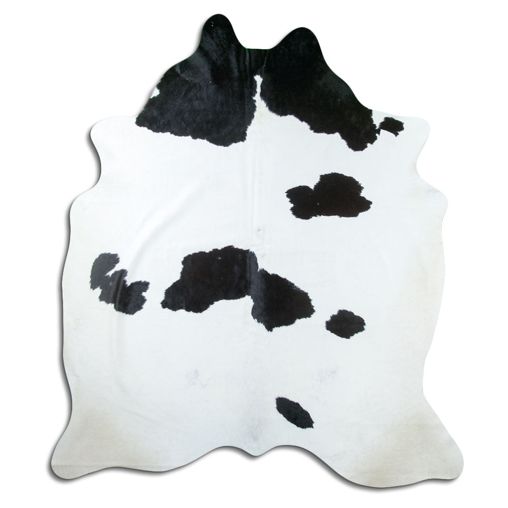 Peau de vache noir et blanc d’environ 210 × 190 cm, vue de dessus : exactement la peau que vous recevez