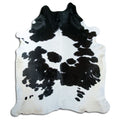 Peau de vache noir et blanc d’environ 240 × 210 cm, vue de dessus : exactement la peau que vous recevez