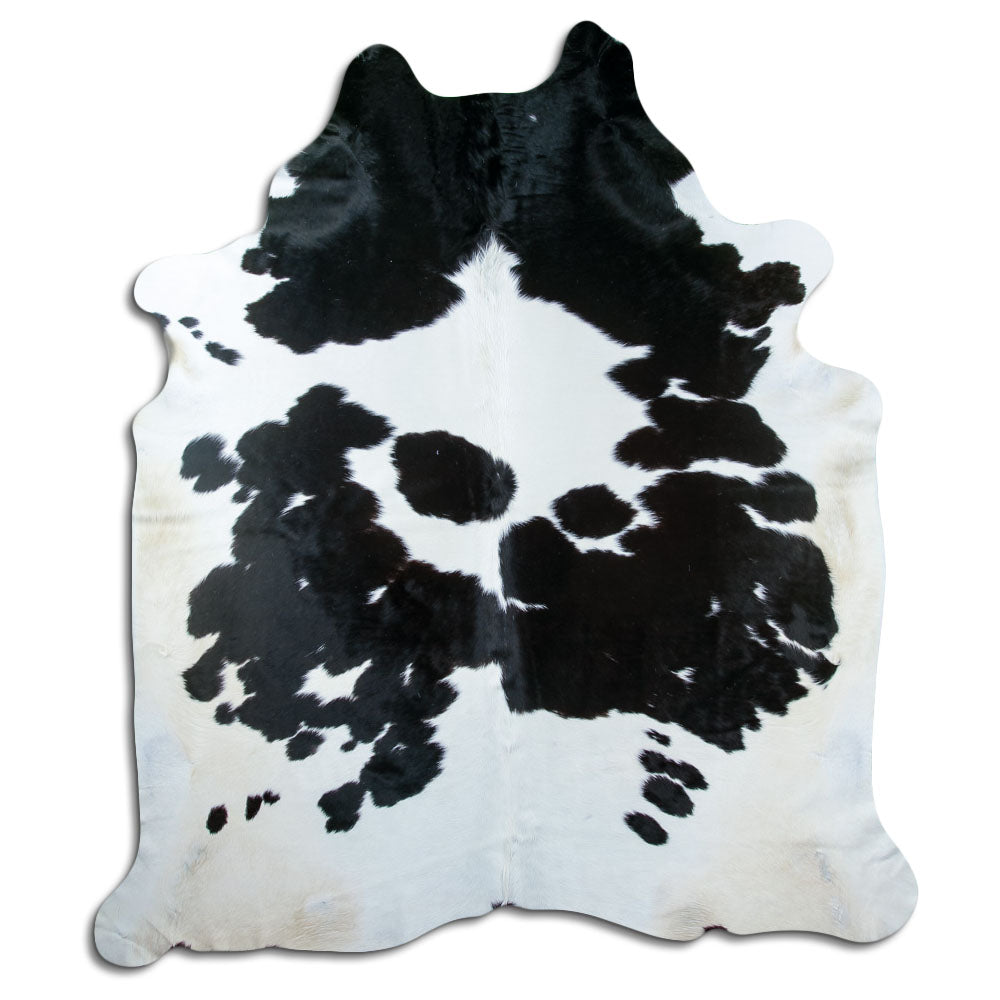 Peau de vache noir et blanc d’environ 240 × 210 cm, vue de dessus : exactement la peau que vous recevez