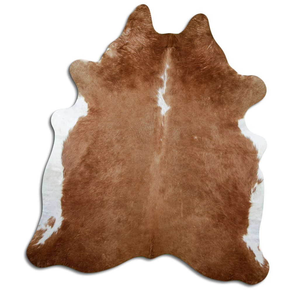 Peau de vache marron et blanc d’environ 220 × 190 cm, vue de dessus : exactement la peau que vous recevez